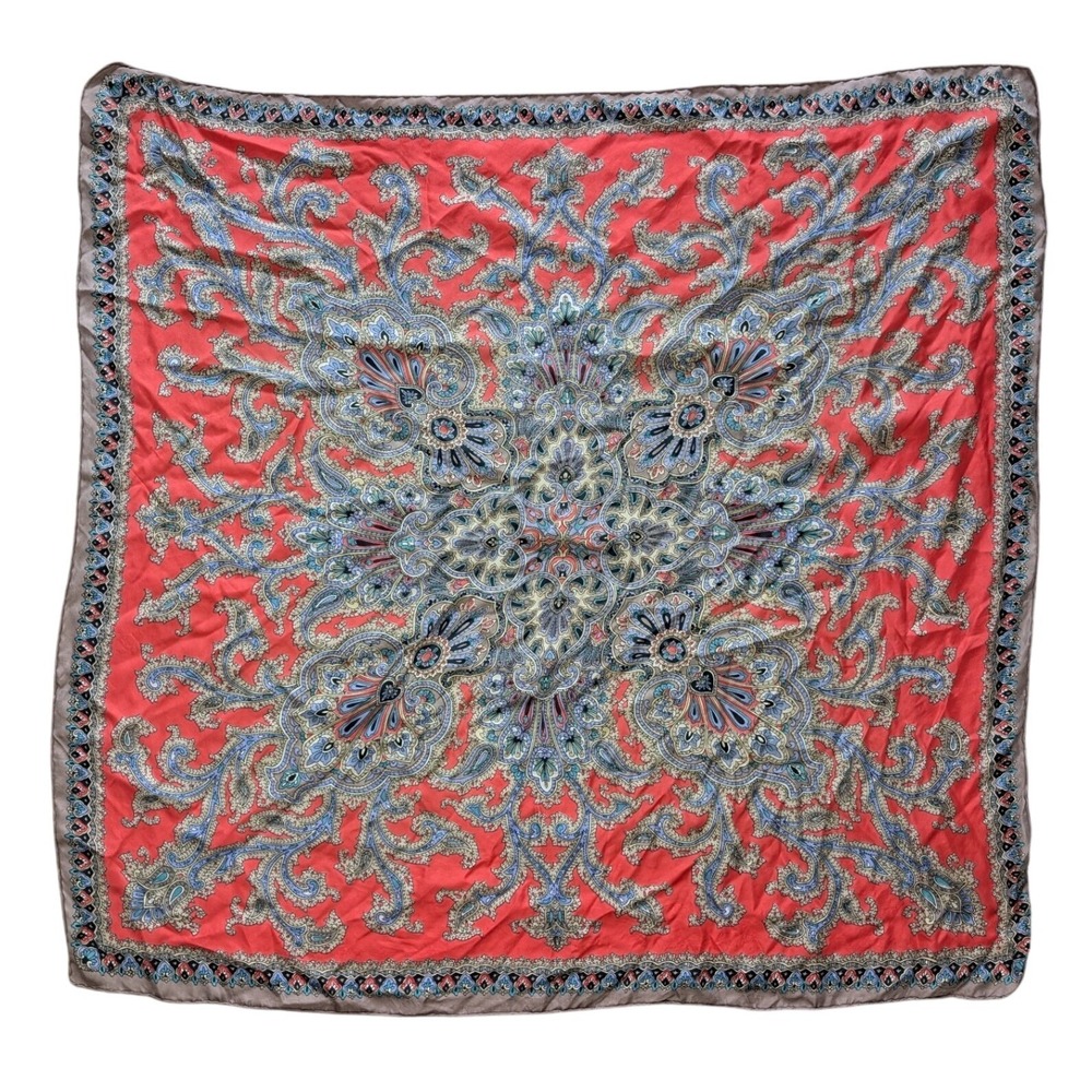 antique style silk scarf features a vibrant red and blue Persian paisley pattern